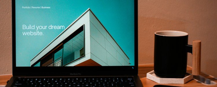 Laptop workspace used for compliance review